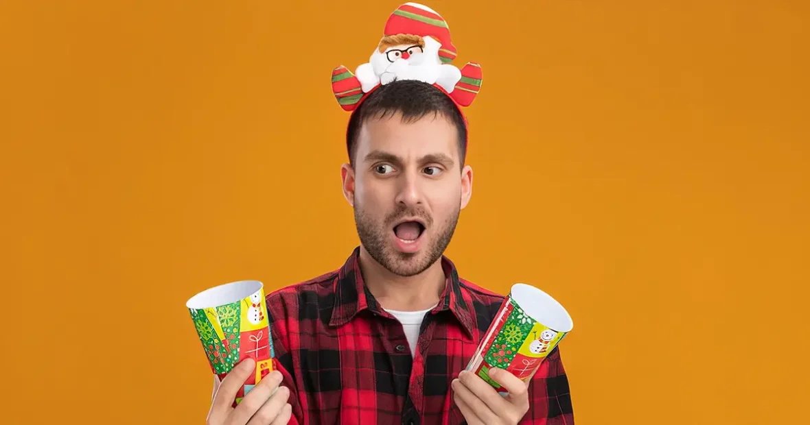 Ünnepi hangulatú illusztráció meglepett férfival, karácsonyi ajándéktárgyakkal